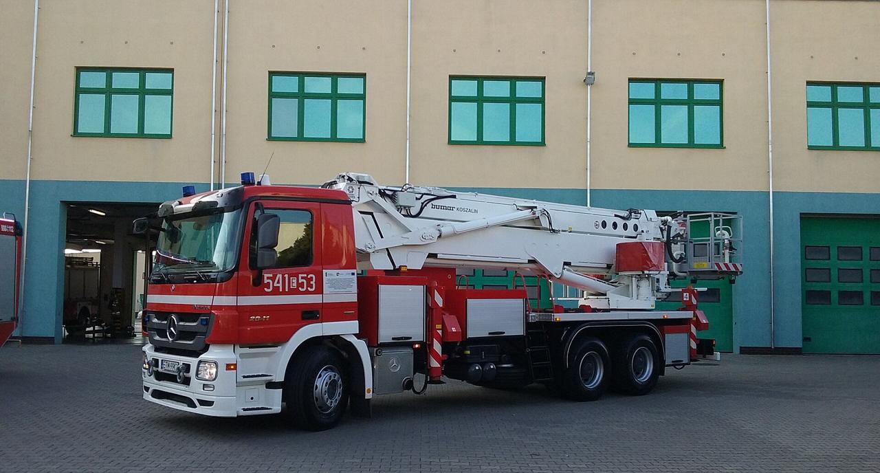 A State Fire Service fire engine with an aerial platform in Poland