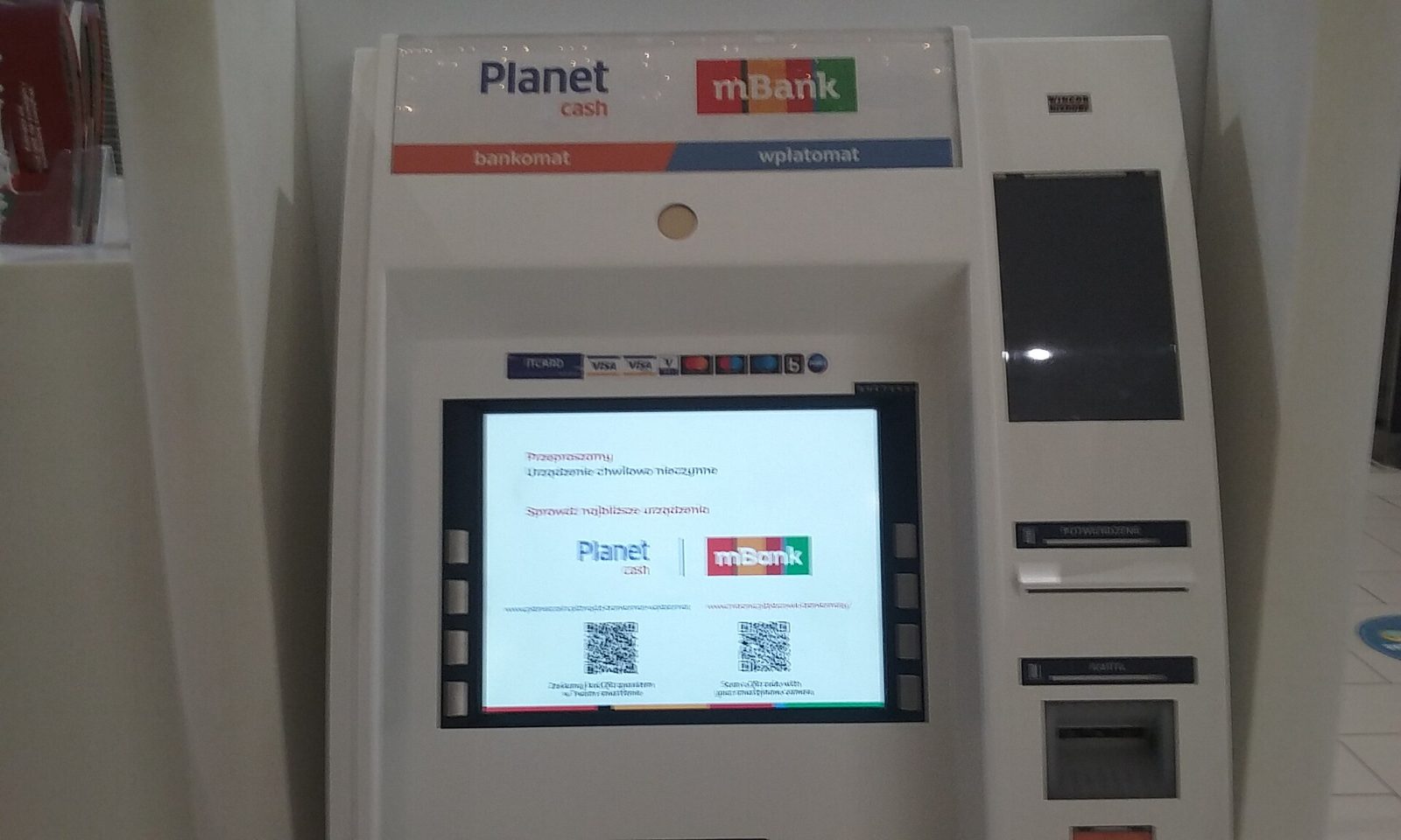 A cash deposit machine and ATM in a shopping centre in Poland
